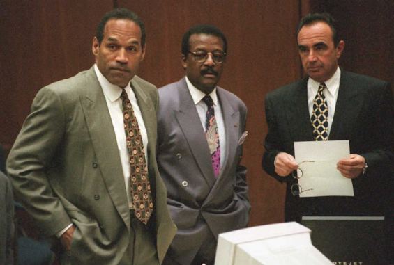 O.J. Simpson (L), Johnnie Cochran Jr. (C) and Robe