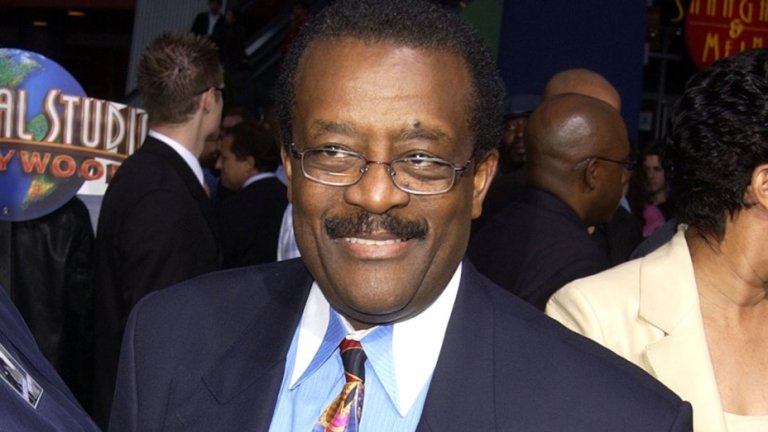 johnnie cochran mole over left eye