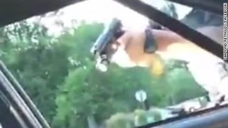 police pointing gun in philando castiles car